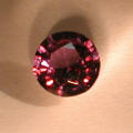 Color Change Garnet changes color to reddish purple in candle light or incandescen light